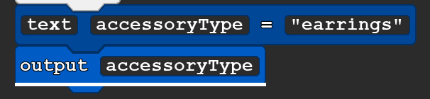 A block of Quorum code that reads:
        text accessoryType = ''earrings''
output accessoryType