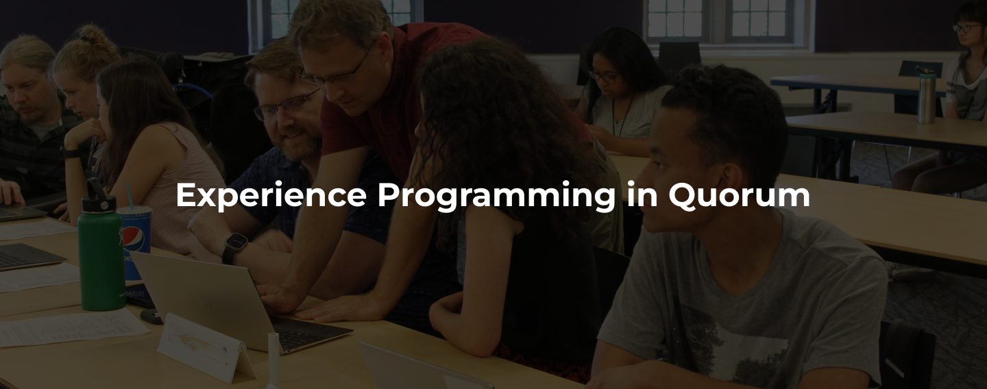 A header of a professor helping students with it saying: Experience Programming in Quorum