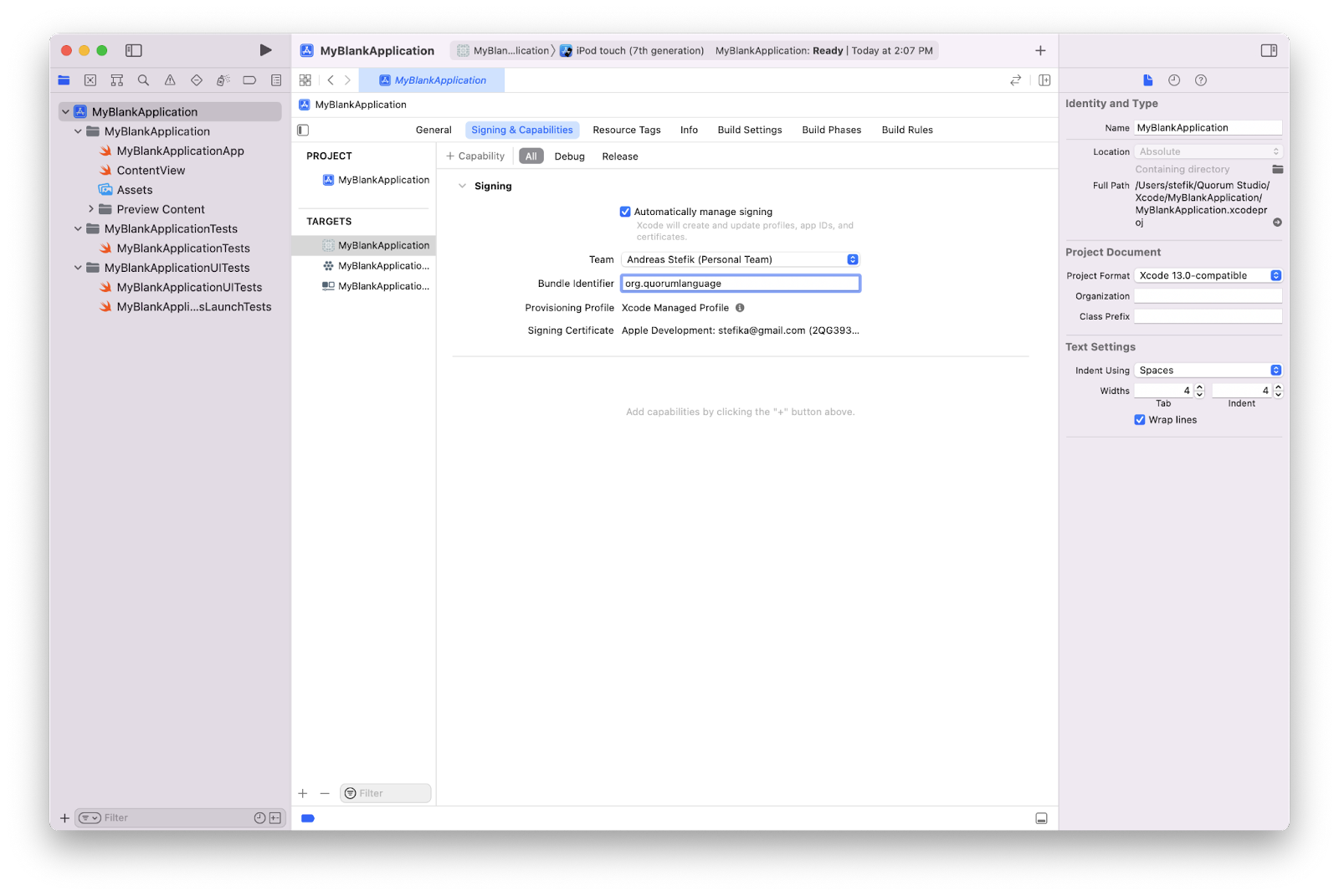 The Xcode Project open to the signing and capabilites section. and the Bundle Identifier field is selected and org.quourmlanguage is in the field.